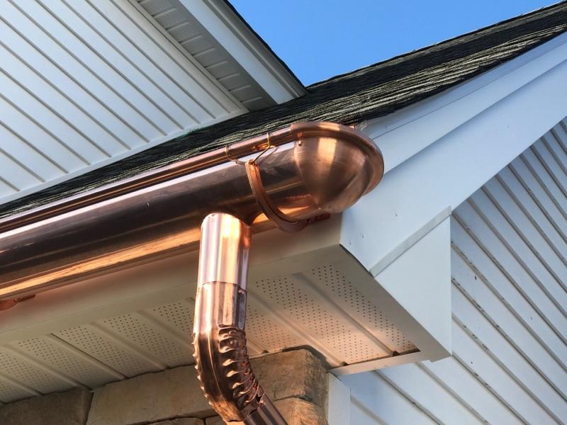 Copper gutter and downspout installation